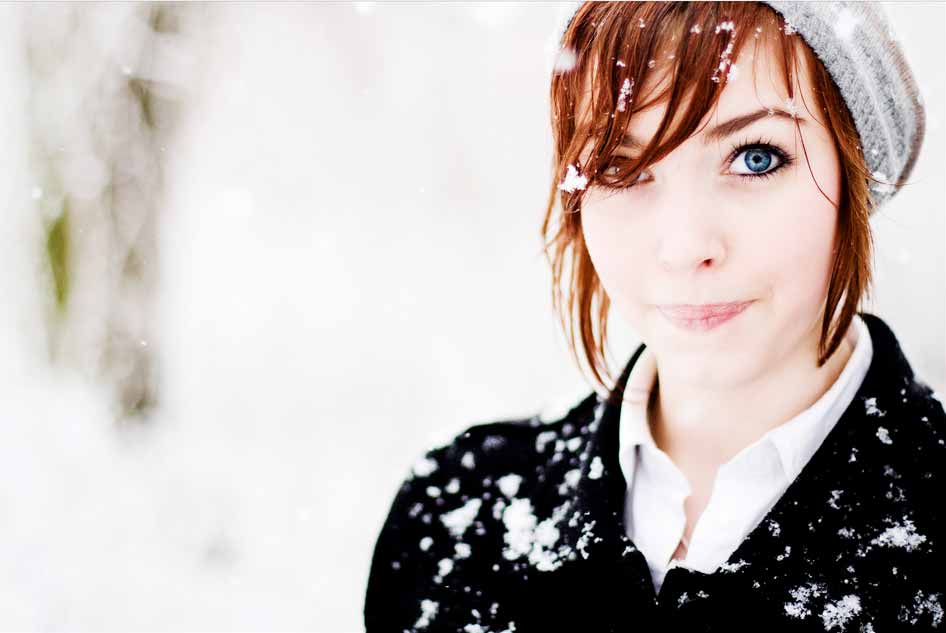 Photograph of a girl in heavy snow